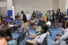 Students in gym at awards ceremony. 