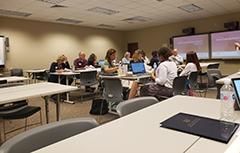 Faculty and Staff in a learning session.